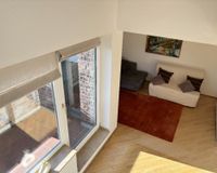 Wohnzimmer mit Balkon