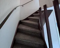 Holzteppe zum Obergeschoss