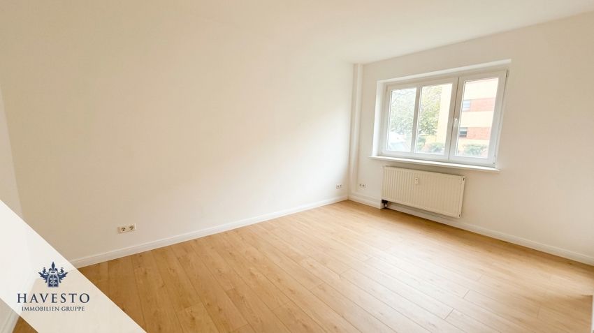 Frisch renovierte 2-Zimmer-Wohnung mit Balkon und Duschbad in grüner Siedlungslage - Foto 3