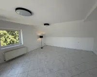 Wohnzimmer gefliest 