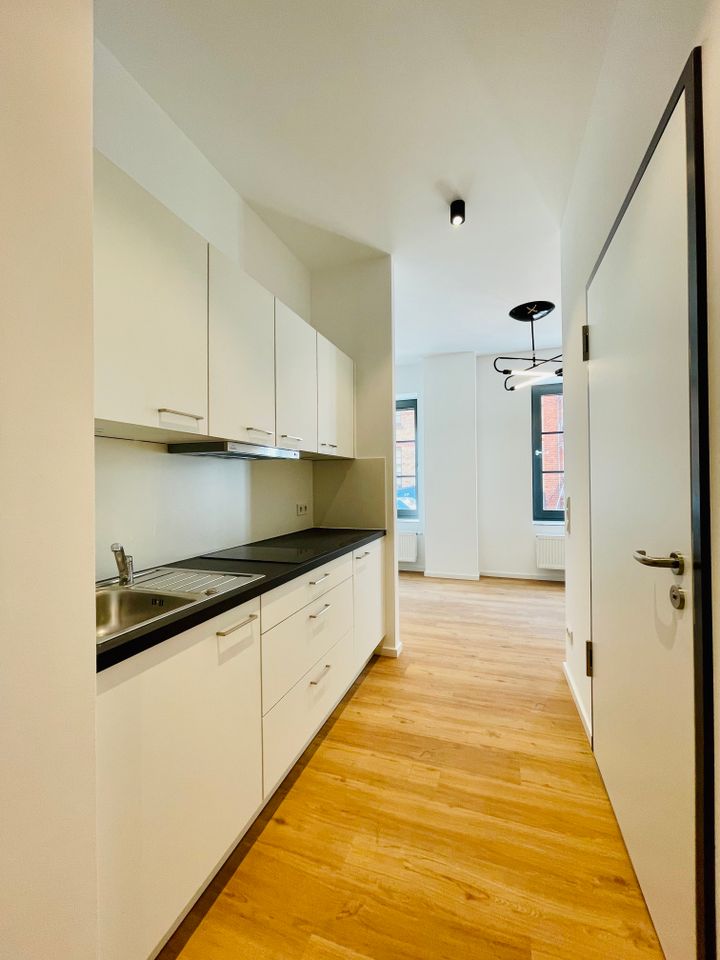Modernes 1-Zimmer-Appartement mit Einbauküche nähe MMT-Campus und UMM in der Alten Brauerei - Photo 2
