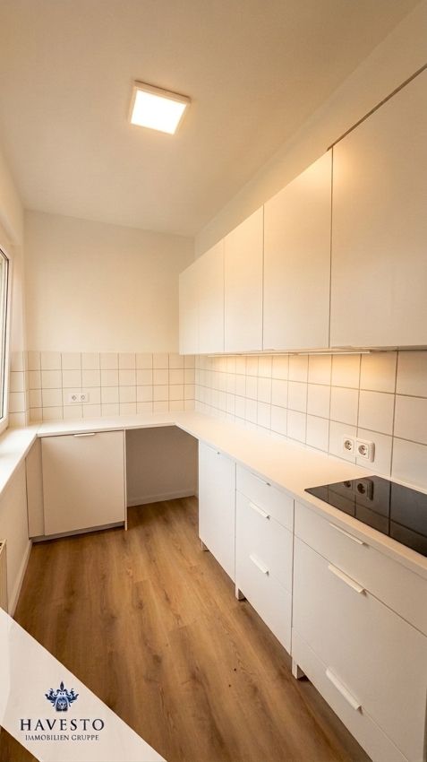 Frisch renovierte 2-Zimmer-Wohnung mit Balkon und Duschbad in grüner Siedlungslage - Foto 4