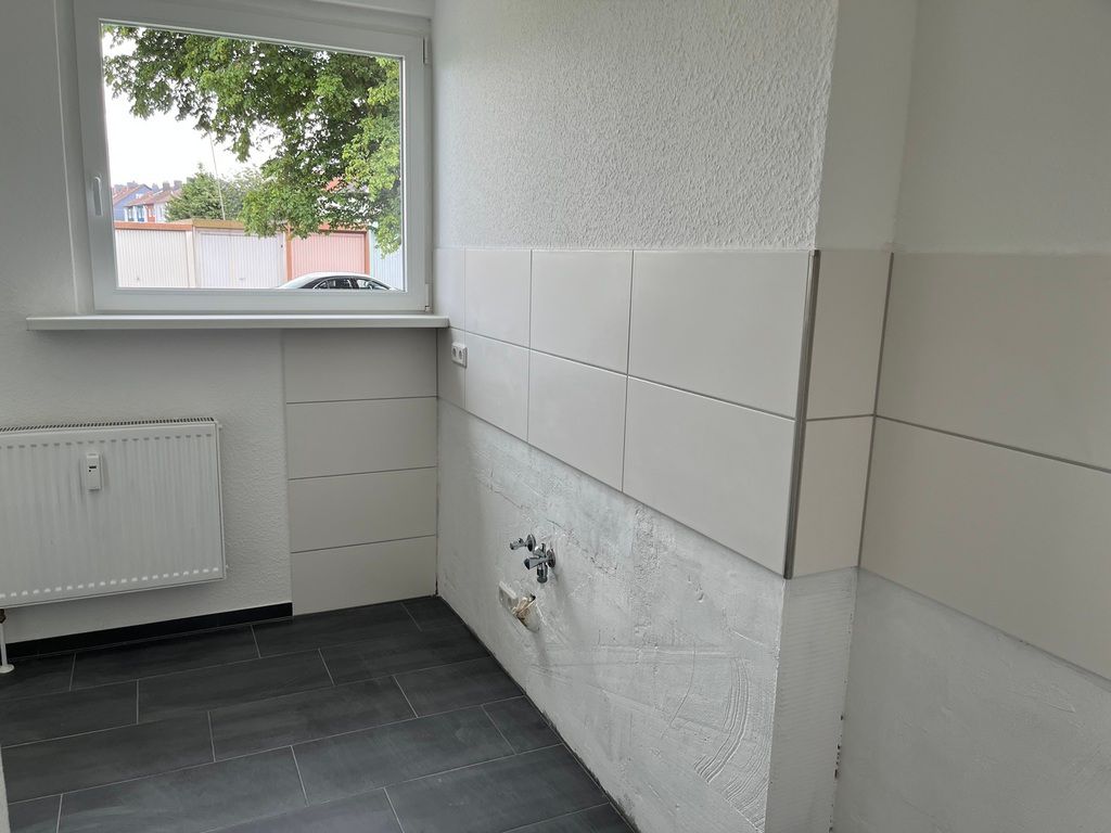 Sanierte 3-Zimmer-Wohnung mit Balkon im EG - Foto 3