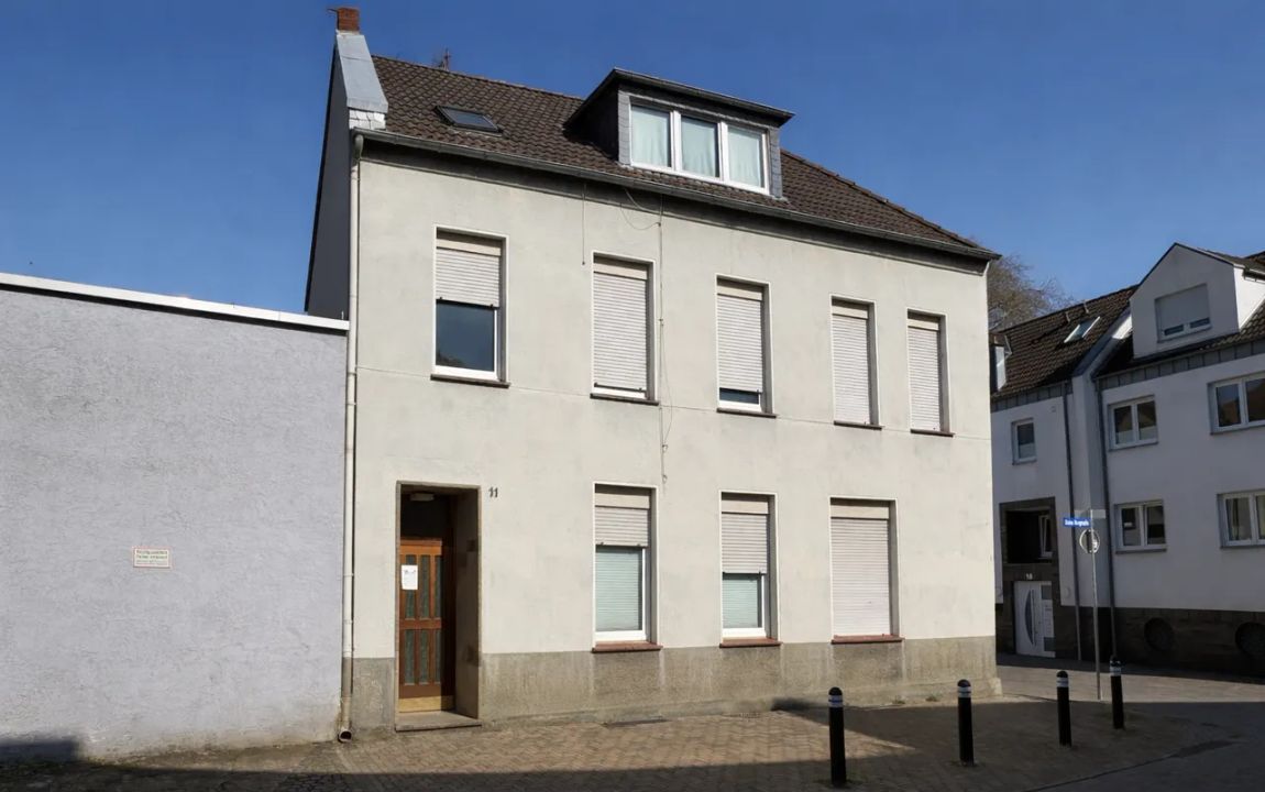 Attraktives Wohn- und Geschäftshaus mit Garage und Stellplatz als Anlageoption