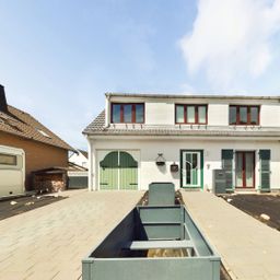 Wohnen mit Wohlfühlfaktor: Ihr Familienhaus mit Garage, Kellerbar & geschütztem Garten