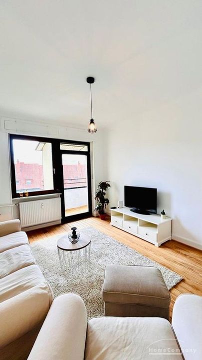 Wohnzimmer mit Balkon