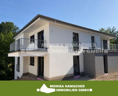 Neubau im Milchborntalweg! 3-Zimmerwohnung im Souterrain mit Terrasse und Garten