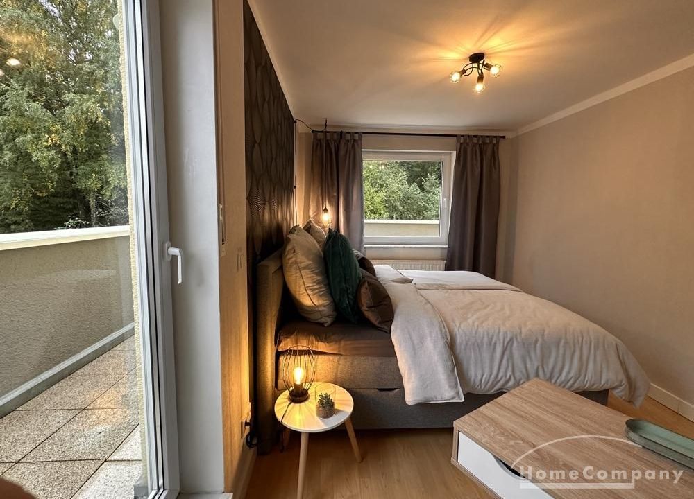 Schlafzimmer mit Zugang zur Terrasse