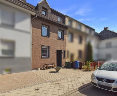 Familienfreundliches Reihenhaus mit Garten, Garage und ausgebautem Dachgeschoss in Düren-Niederau