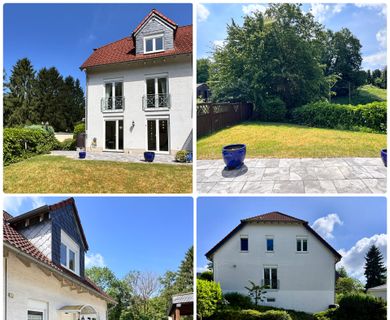Familienfreundliche Doppelhaushälfte in attraktiver Hanglage mit Garten und viel grüner Umgebung.