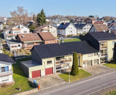 TOP-ANGEBOT – 6 Parteienhaus mit 6 Garagen in zentraler, ruhiger Lage von Asbach zu verkaufen !!