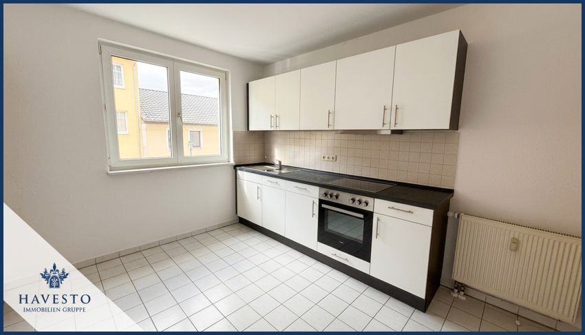 Lichtdurchflutete 2-Zimmer-Wohnung auf 64,80 m² mit Einbauküche und Balkon - Photo 4