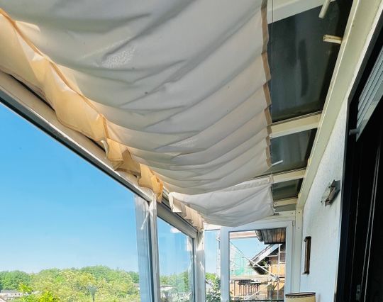 Balkon mit Teilwintergarten