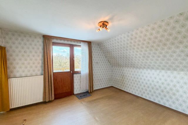 Schlafzimmer mit Zugang zur Dachterrasse