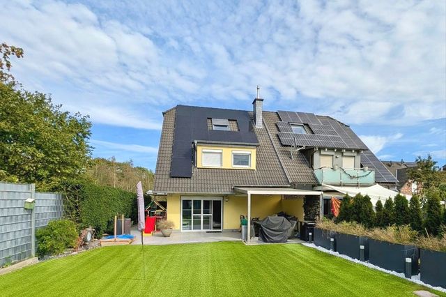 Gartenansicht - PV Anlage seit 2026