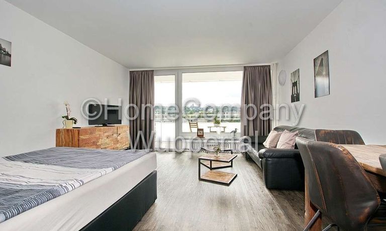 Business- Apartment im Industrial-Style mit Süd-Balkon, DSL-Wifi und Reinigungsservice - Photo 3