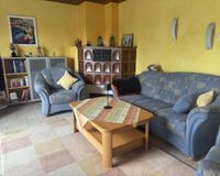 Wohnzimmer obere Wohnung