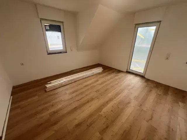 Wohnzimmer m. Balkon