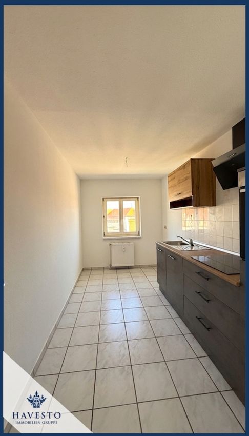 Frisch renovierte 2-Zimmer-Dachgeschosswohnung mit ca. 58,80 m² Wohnfläche und Einbauküche. - Foto 1