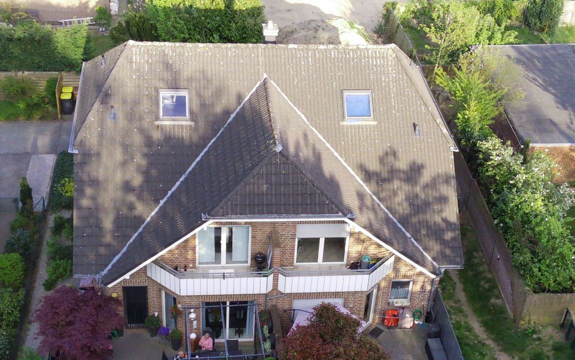 Massives Vierfamilienhaus mit attraktiven Wohnflächen, privatem Garten und Balkonen