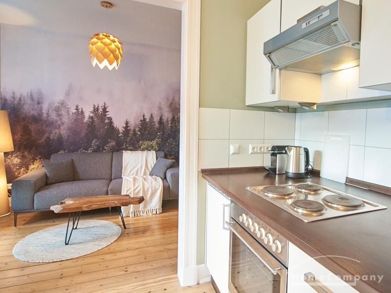 Wohnzimmer mit offener K&uuml;che