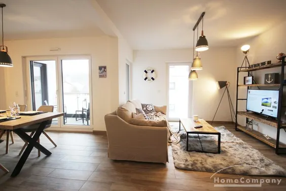 Neubau  Hell und modern eingerichtete Wohnung mit Balkon