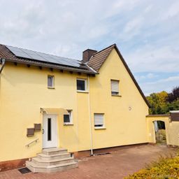 Doppelhaushälfte mit Photovoltaik-2 Wohneinheiten, Garten und Garage