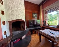Wohnzimmer mit Kamin