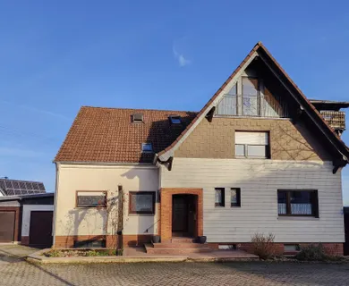 ***Reduziert***Einfamilienhaus mit ELW, 2 Garagen und Fernblick zwischen Flammersfeld und Horhausen!