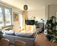 Wohnzimmer mit Balkon