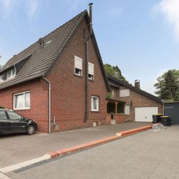 Raumwunder mit Rendite & Grünblick: Gepflegtes Zweifamilienhaus auf über 1.000 m² Grundstück
