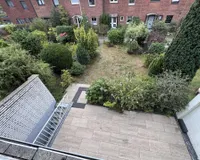 Blick Balkon in den Garten