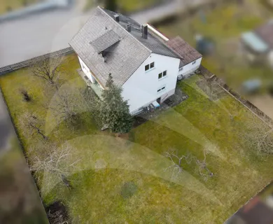 Dreifamilienhaus mit zusätzlichem Baugrundstück